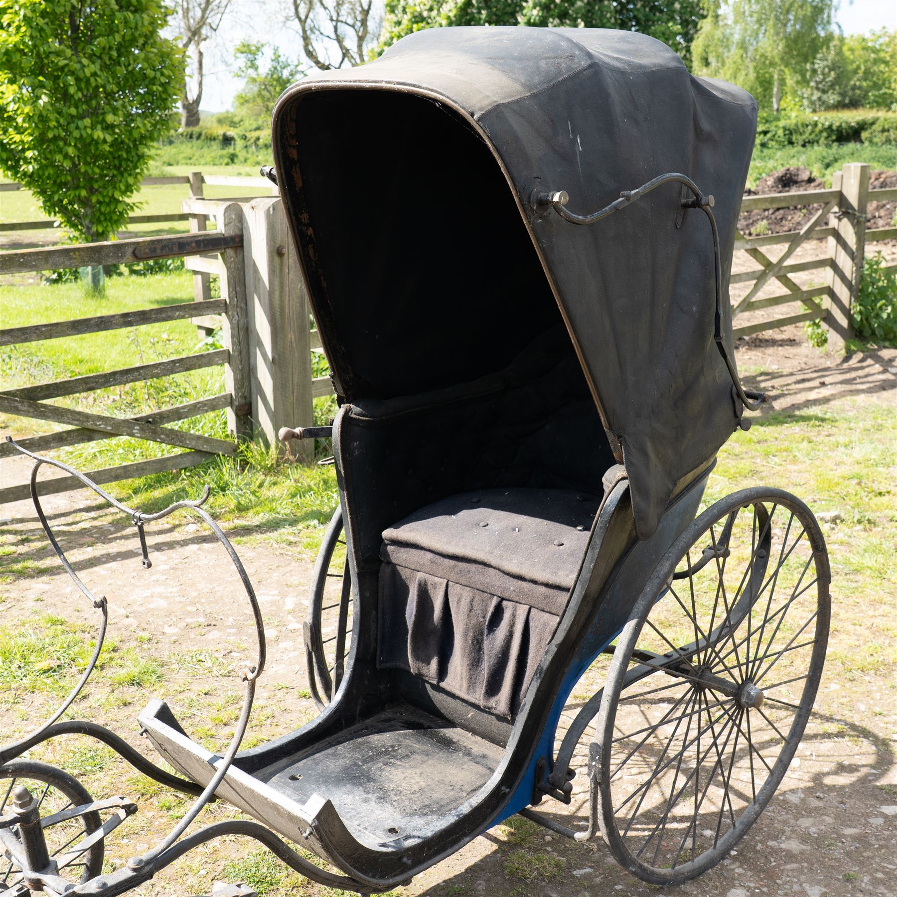 Victorian Bath Chair / Invalid Carriage Converted for Horse Drawn Use

A Victorian bath chair or invalid carriage, later converted for horse drawn use, with black painted bodywork, blue side panels, folding black leather hood and upholstered single passenger seat. The carriage is fitted with large rear wire spoked wheels, smaller front steering wheels, long shafts, footwell and curved body sides, consistent with a late nineteenth century invalid carriage or bath chair form adapted for pony or light horse use.

Features

Bath chair or invalid carriage form
Later converted for horse drawn use
Folding black leather hood
Single upholstered passenger seat
Deep footwell
Black painted body with blue side panels
Large rear wire spoked wheels
Smaller front steering wheels
Long shafts
Lightweight carriage frame

Dimensions:
Overall length: 380 cm
Body length: 204 cm
Width: 88 cm
Height: 178 cm

Wheel Diameters:
Front wheels: 47 cm
Rear wheels: 88 cm

Seating:
Driver: 1
Passenger: None