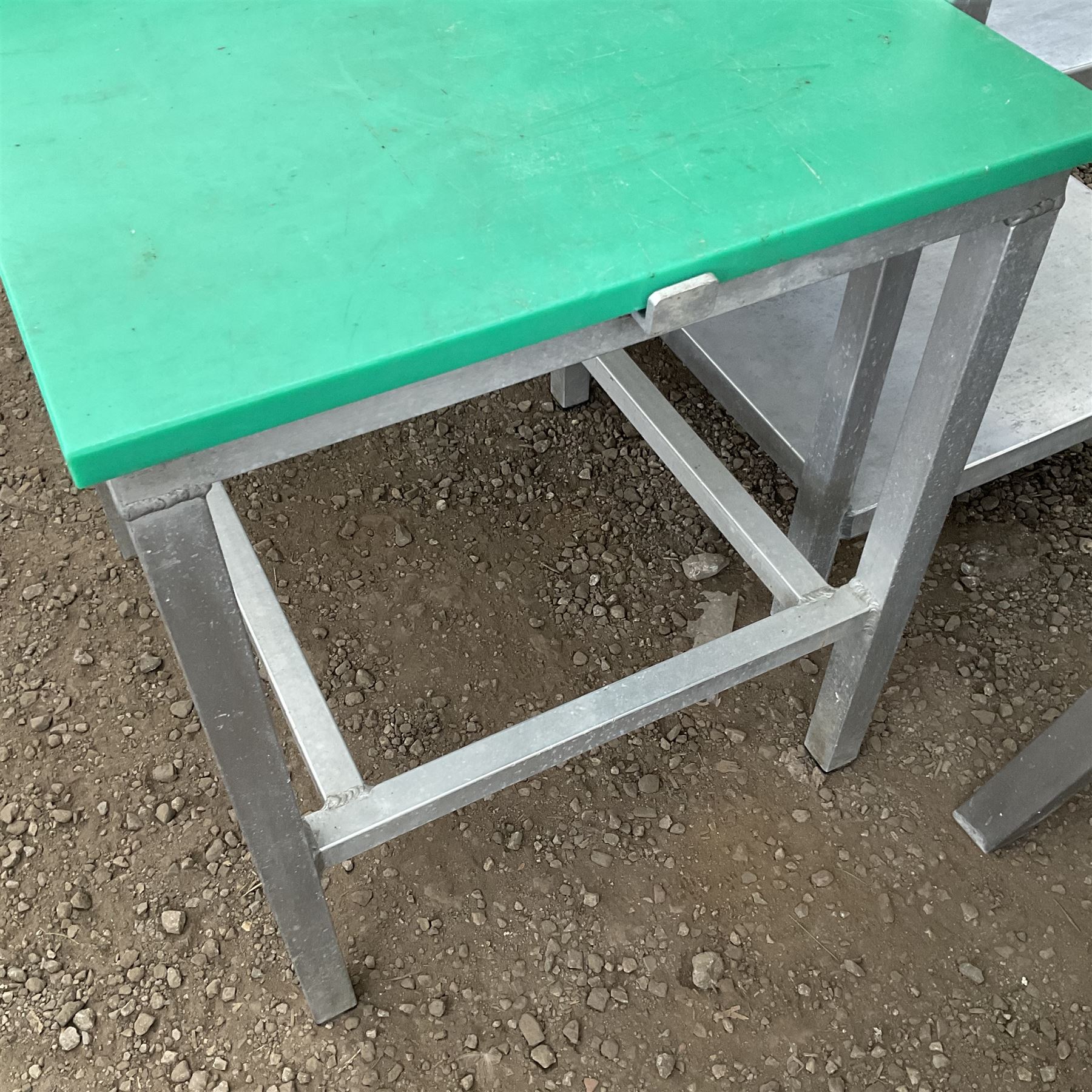 Aluminium framed two height tiered preparation table with poly top The Entire Contents of