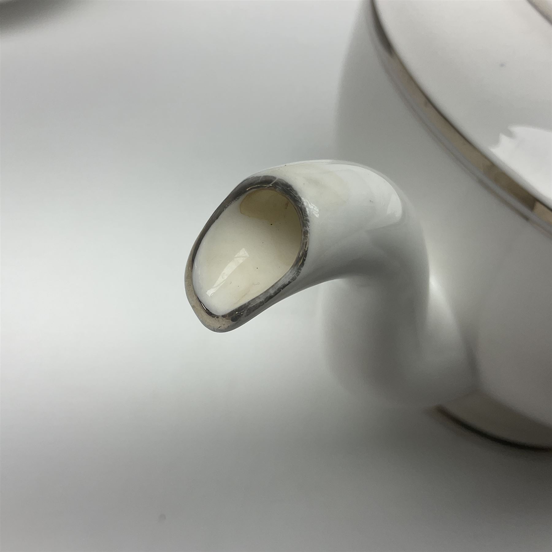 Royal Worcester Beaufort tea service, comprising teapot, milk jug, open saucier, eleven teacups, twelve saucers, eight dessert plates and one cake plate