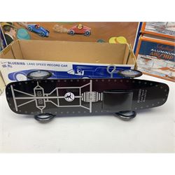Schylling - six tinplate models comprising Sir Ian’s Bluebird racing car, Speedway Auto Racer, two Aluminium Airships, Tin Speedboat and Ernest in the Music Box; all in original boxes 