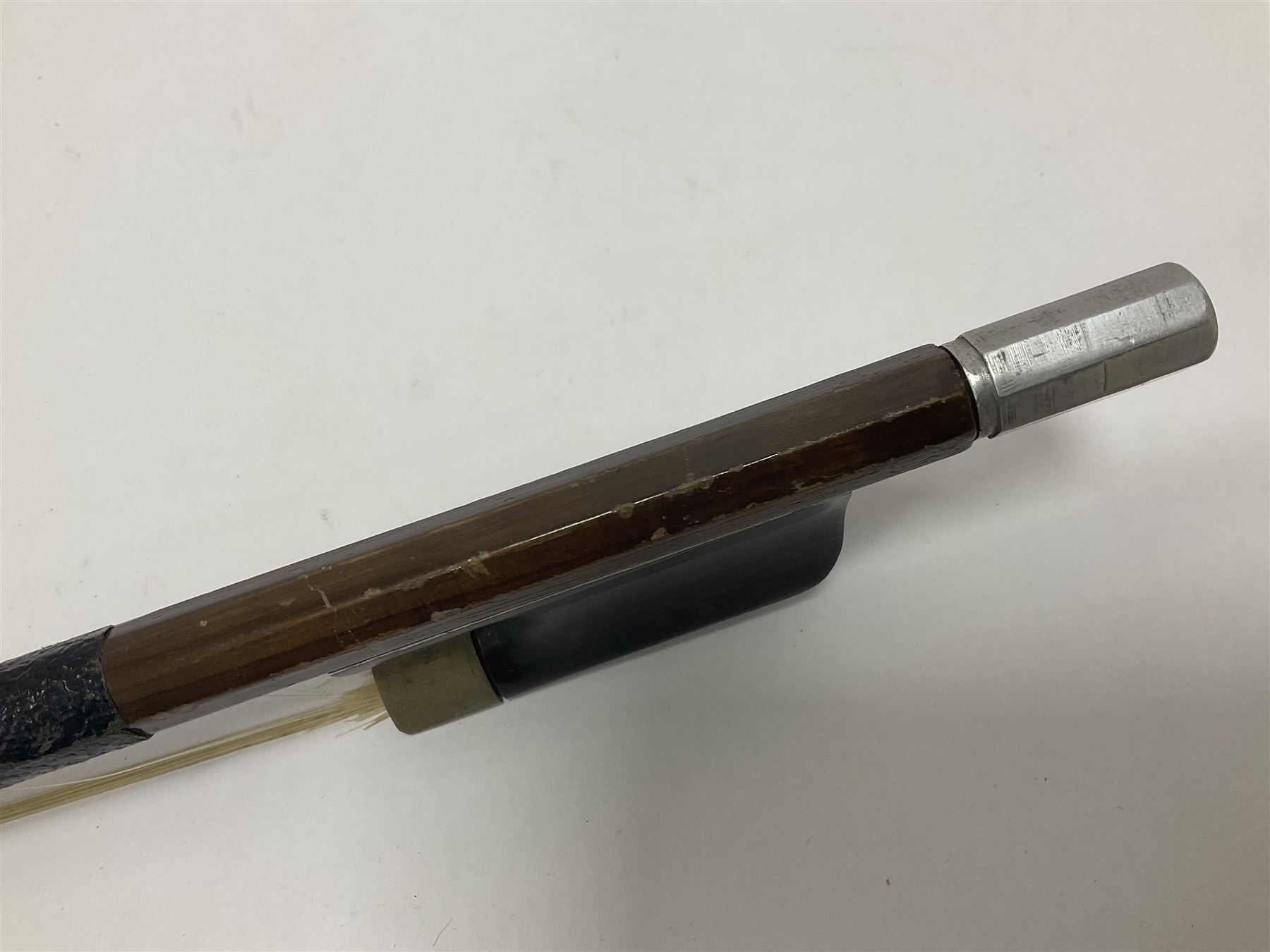 Wooden double bass bow with a mother of pearl inlay to the frog Length 71cm