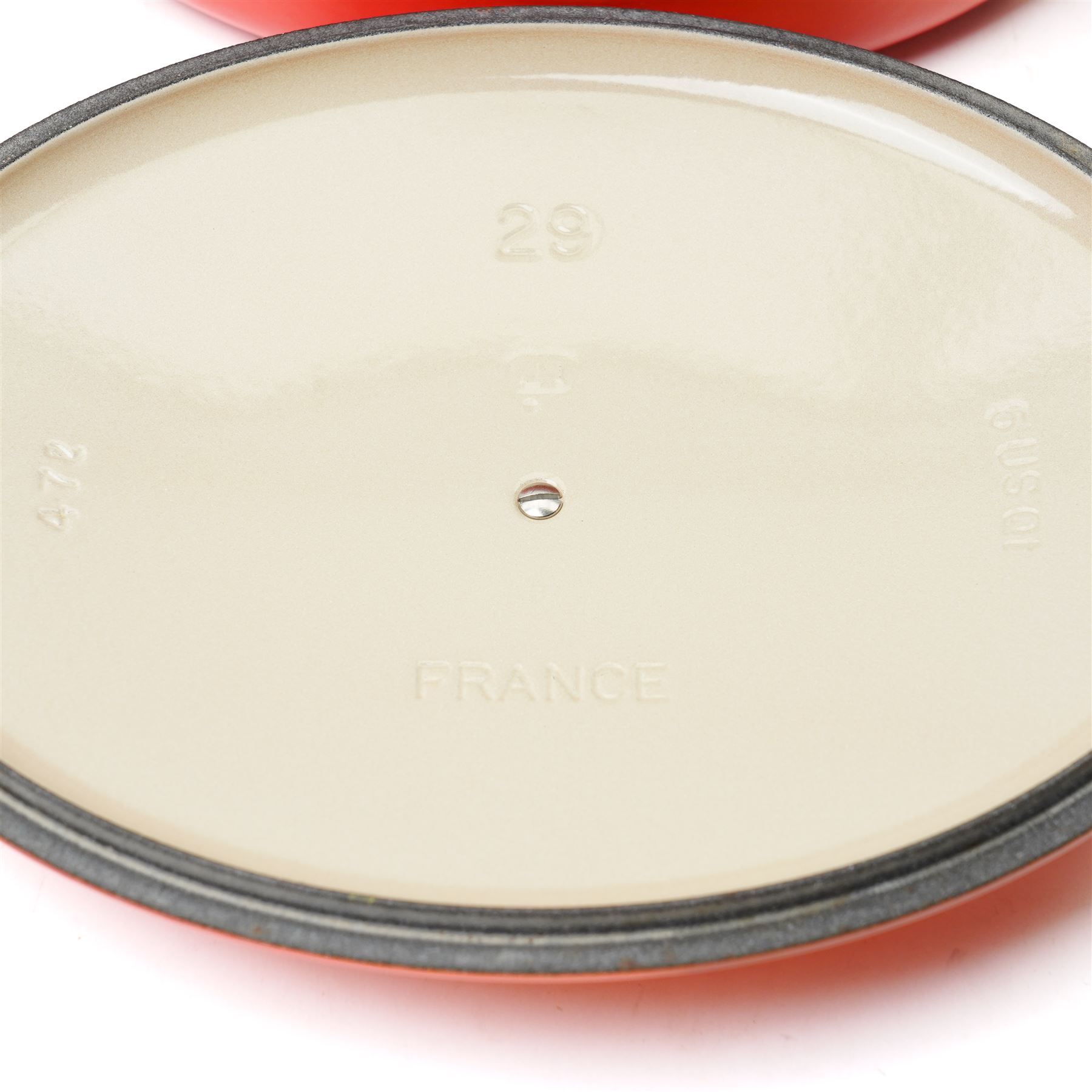 Le Creuset oval casserole dish and cover,  and another shallow example, in the Volcanic colourway