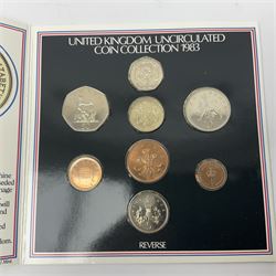 Fourteen Queen Elizabeth II United Kingdom uncirculated coin collections, dated 1983, 1984, two 1985, 1986, 1987, 1988, 1989, 1990, 1991, 1992 including dual dated 1992/1993 EEC fifty pence, 1994 and two 1995, all in card folders