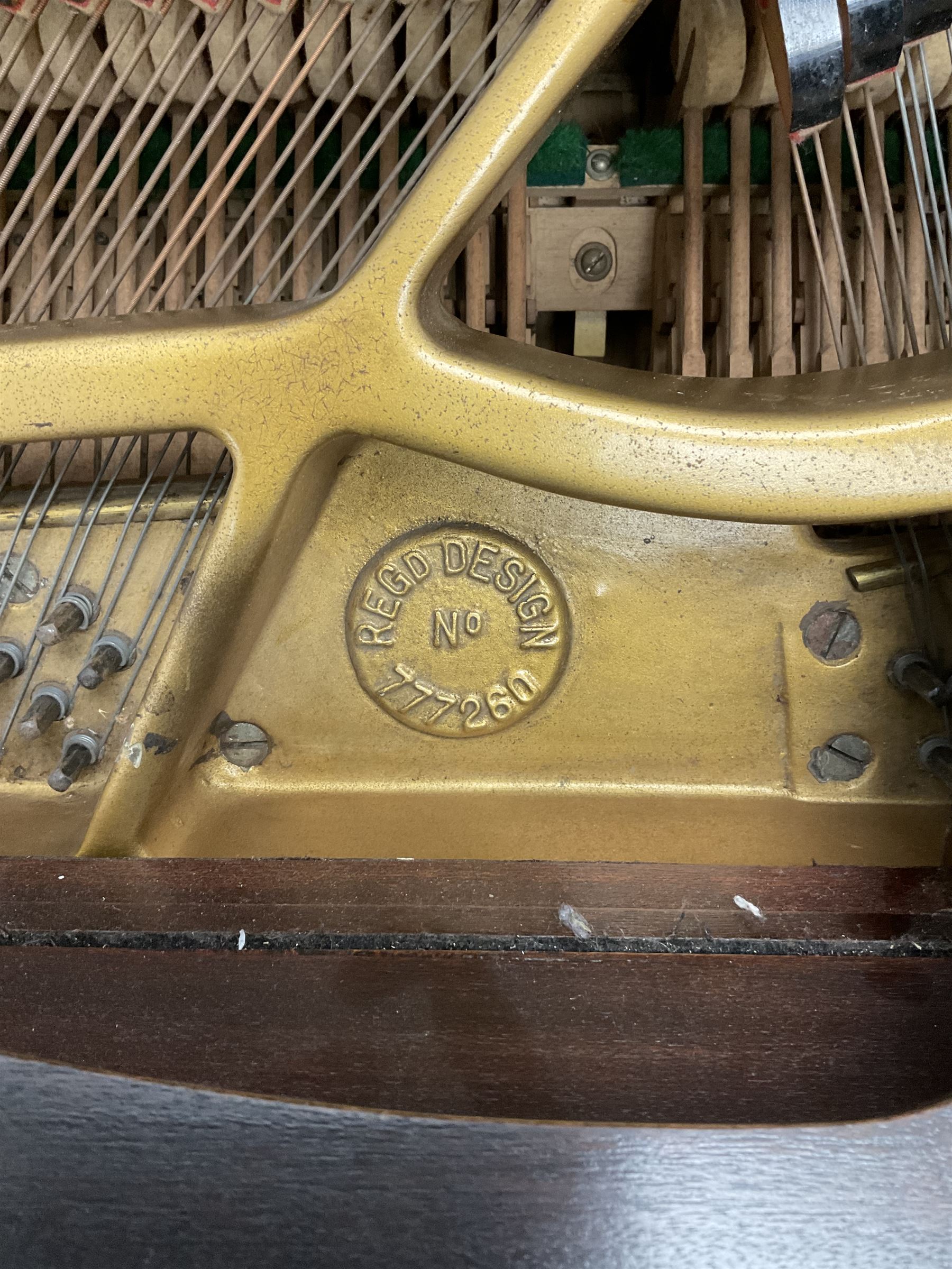 Early 20th century mahogany cased Strohmenger London baby grand piano, demi lune shape, over strung cast iron framed, raised on square tapered supports and castors 