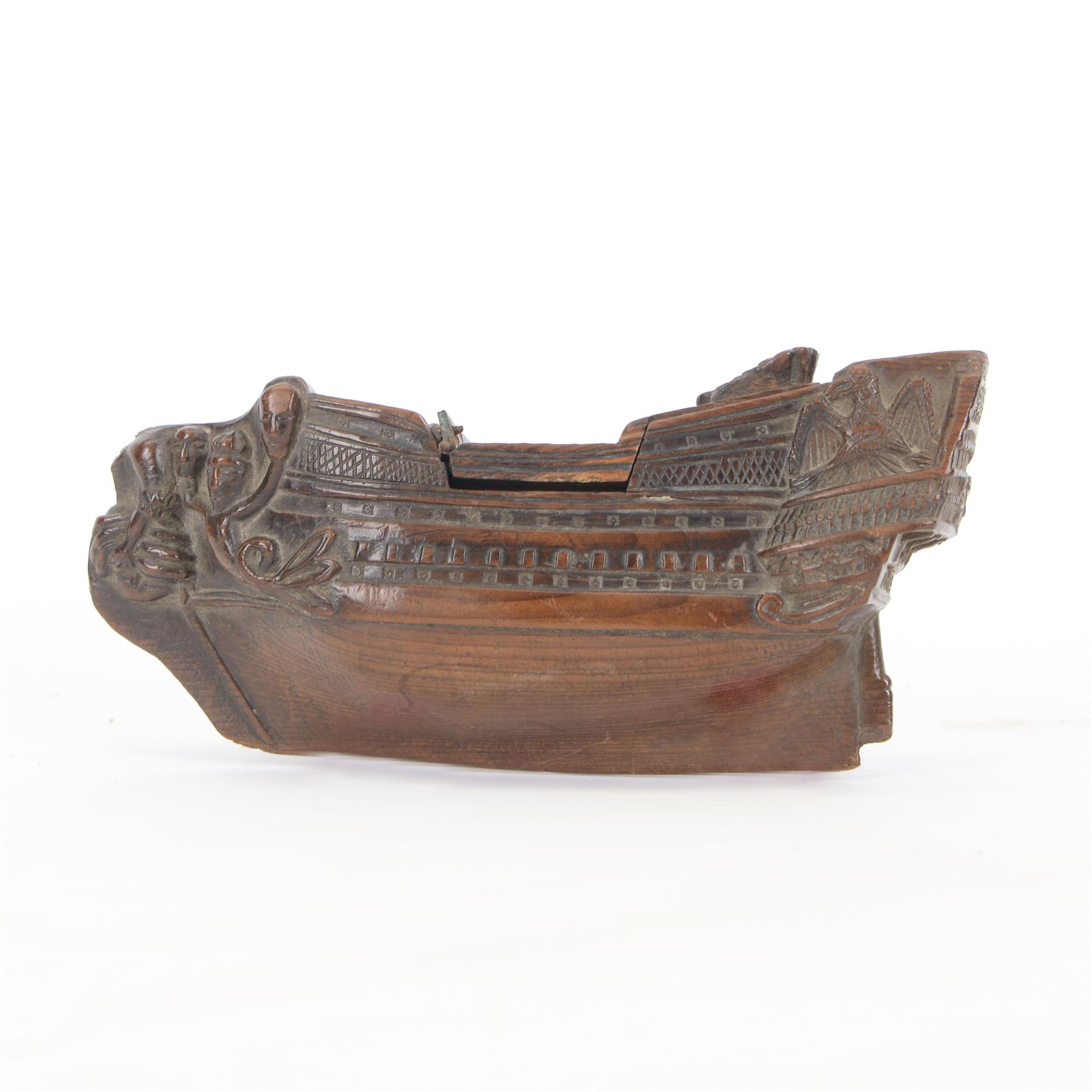 19th century treen snuff box in the form of a ship, with carved detail including windows and mythical figures, L15cm, H6cm