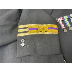 Collection of vintage style clothing, including replica military style clothing, bags, shirts and jackets