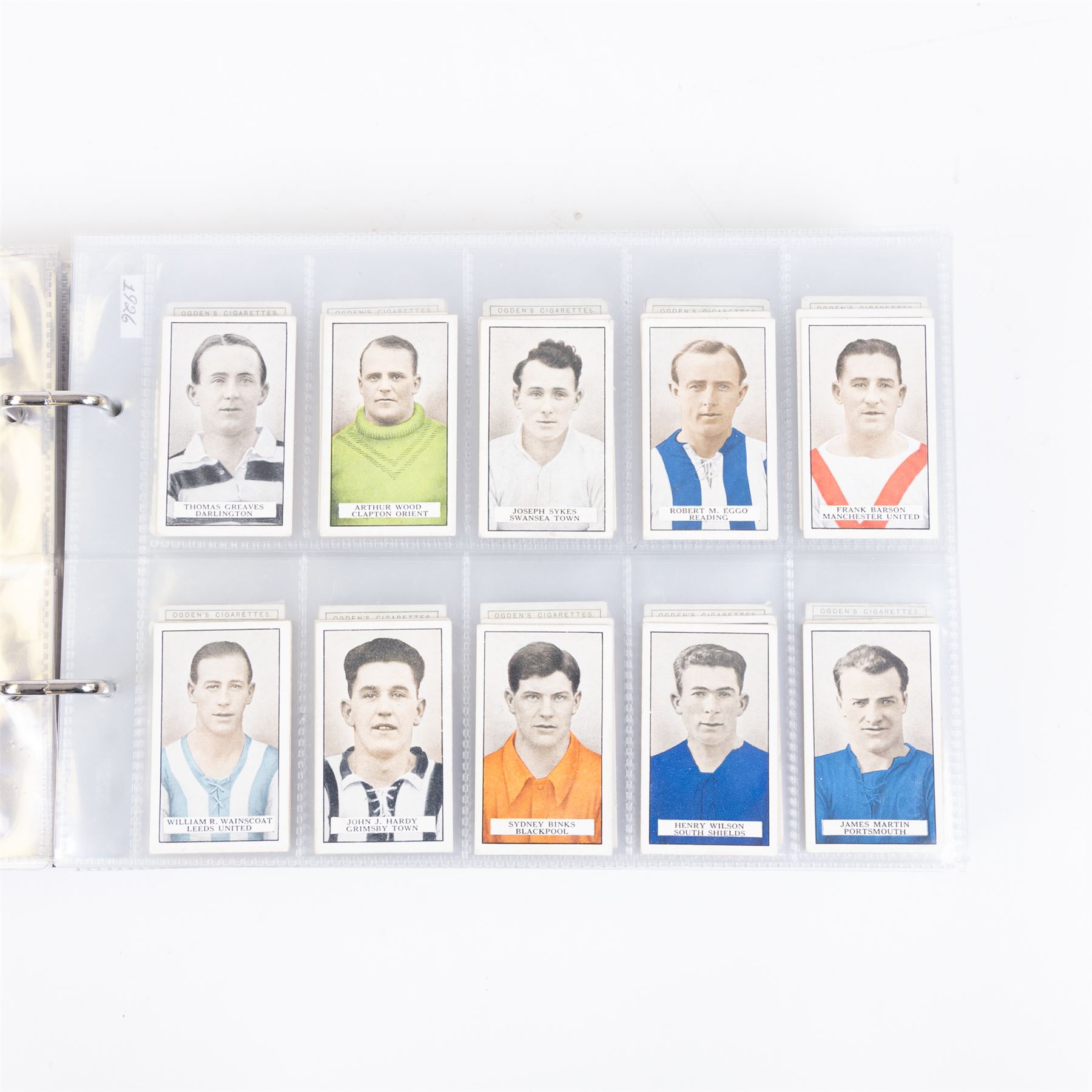 Collection of Edwardian and later Football related trading and cigarette cards, including forty-nine of fifty 1906 Ogden's Football Club Colours, 1922 PALS Footall series, ninety of one hundred 1925 Gallaher Famous Footballers, complete set of forty-four 1926 Ogden's Captains of Association Football Clubs and Colours, complete set of fifty 1927 Players Football Caricatures by MAC,  complete set of fifty 1927 Players Football Caricatures by RIP,  complete set of fifty 1930 Players Association Cup Winners, complete set of 50 1933 Ogdens AFC Nicknames etc, housed in brown cigarette card album