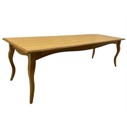 Light oak rectangular dining table, shaped cabriole supports