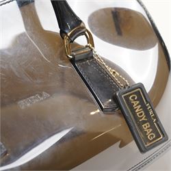 Furla - ‘Candy’ top-handle bag in smoky black transparent PVC, with rolled top handles, gold-tone hardware padlock, with front-hanging charm chain, with original Furla dust bag