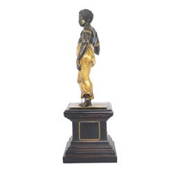 19th century brass finished, and gilded figure, probably originating from a clock, now set on associated base, H36cm

Note: Comparable figure sold Christies, Interiors sale, including the collection of the late Serge Baillache, 20 May 2014, lot 252