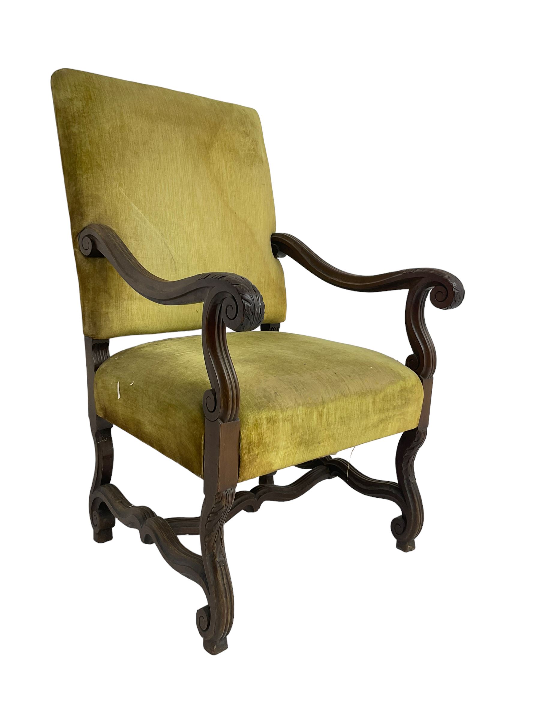 Early 20th century Carolean design mahogany framed throne chair, back and sprung seat upholstered in sage green fabric, scrolled amd reeded arms with carved oak leaf design, shaped supports with scroll feet united by waived stretchers