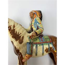 A Beswick Native American on horseback, with printed mark beneath, H21.5cm. 