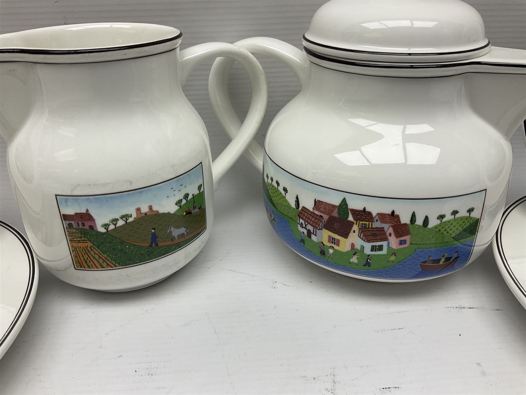 Villeroy and Boch Naif pattern tea service, comprising teapot, jug, covered sucrier, two mugs, two breakfast bowls and four side plates (11)