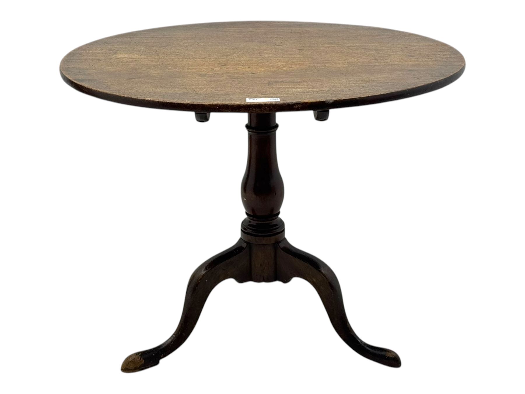 19th century mahogany tilt-top occasional table, circular top on a turned baluster column, raised on three splayed supports