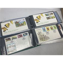 First day covers including  Great British, Isle of Man, Jersey, various covers from 'The History of WWII' collection etc, housed in twenty-two ring binder folders, in two boxes