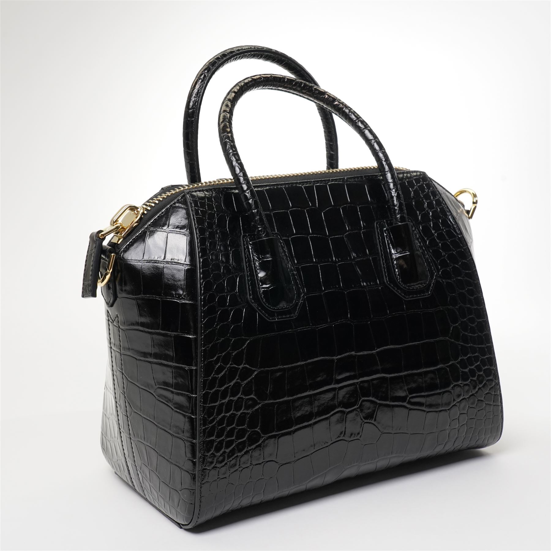 Givenchy - ‘Antigona’ Small Bag, introduced circa 2011 under Riccardo Tisci, in black crocodile-embossed calf leather, with twin top handles and detachable wide shoulder or crossbody strap, with gold tone hardware, unused with original dust bag