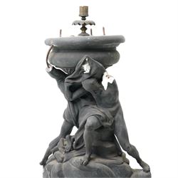 Neoclassical 19th century plaster pedestal, the base cast as two straining Atlantes on a naturalistic rocky base, unmarked, excluding fittings H65cm; together with a set of three plaster figures, cast as Egyptian ladies in headdresses and draped in cloth, by John Dominic Giannelli (1775-1841), the reverse with hieroglyphic decoration, inscribed 'Published as the Act Directed By J D Giannelli 1805', possibly corresponding attachments for the aforementioned pedestal, H62cm 
Provenance: property of a Nobleman