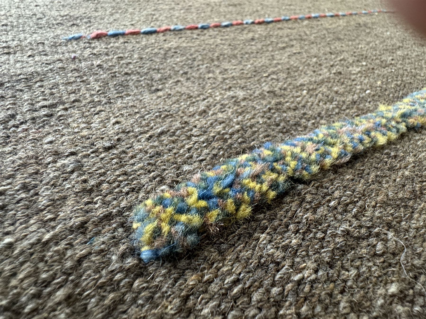 Shiraz Kilim rug, decorated with multi-coloured and patterned horizontal lines 