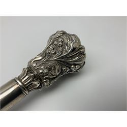 Silver topped walking cane, with embossed decoration in the Victorian taste of flowers, berries and acanthus leaves, stamped 925, upon an ebonised shaft, L94cm