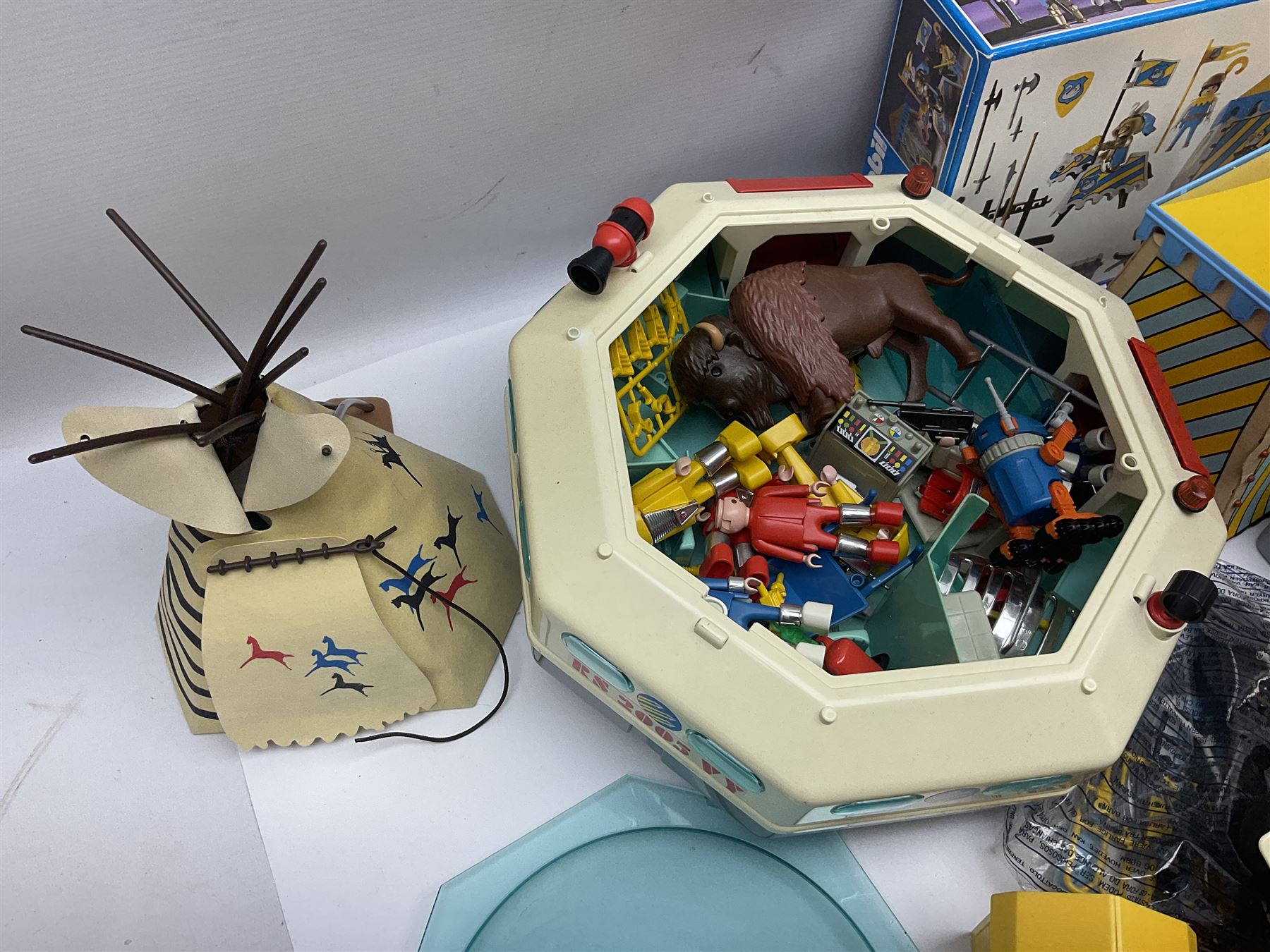 Collection of 1980s/90s Playmobil - vehicles including Fire-Engine No.21, Mobil Crane No.28, Quick Service Truck No.1 with trailer, Dumper Truck, GSL Sports car, GS Turbo car and three motorcycles; together with boxed Knights Tournament Set, Playmospace Space Station and Shuttle, wigwam and various accessories and figures etc