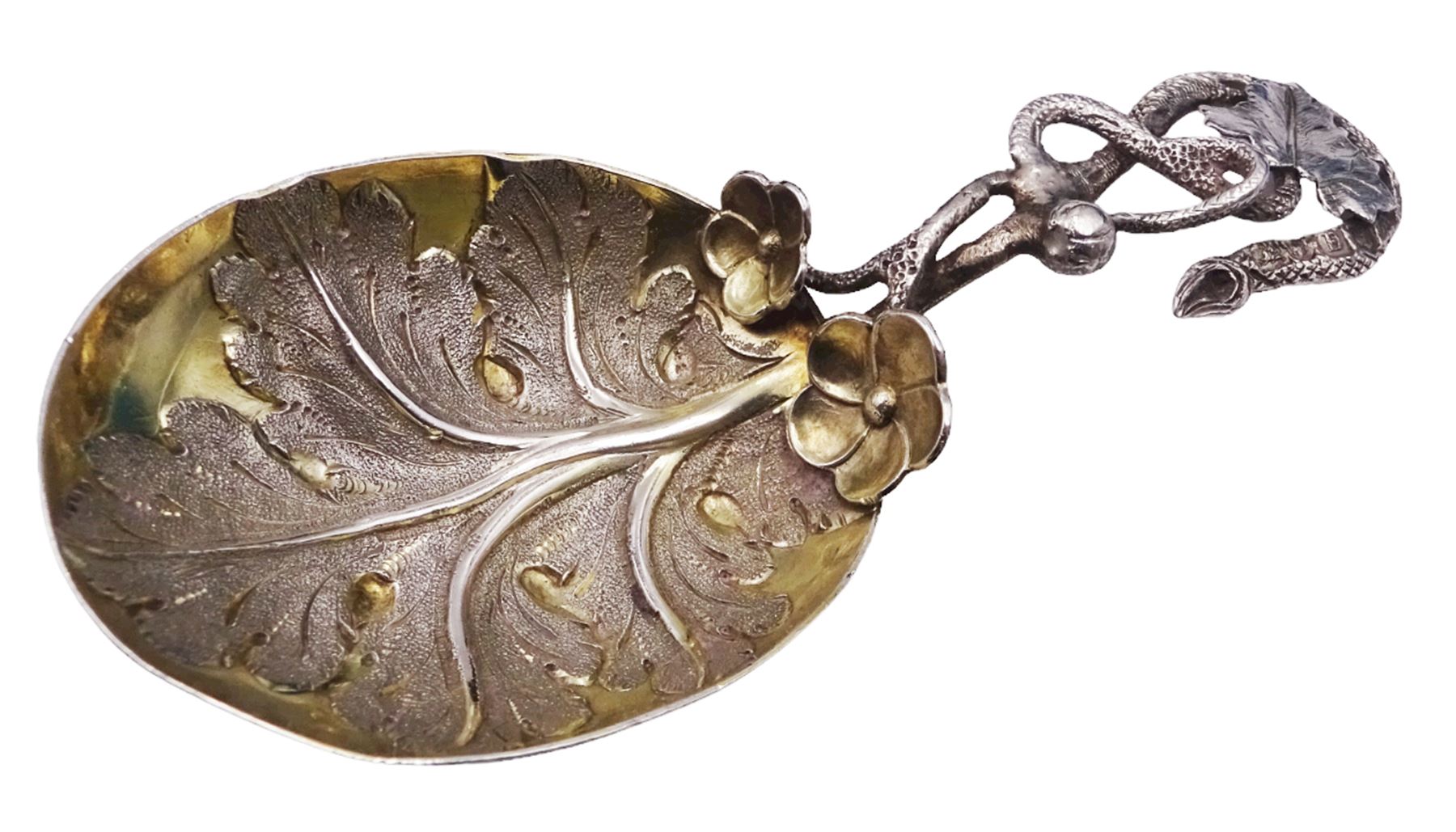Unusual Victorian silver caddy spoon, the oval parcel gilt bowl embossed with leaf, leading to a flower head mounted tendril handle also detailed with leaf, hallmarked Hilliard & Thomason, Birmingham 1853, L8.5cm, approximate weight 0.49ozt (15.3 grams)