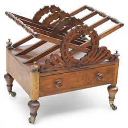 19th century mahogany music canterbury, with pierced dividers united by turned handles, ab...