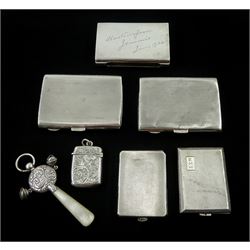 Victorian silver babies rattle, with mother of pearl handle by G E Walton & Co Ltd, Birmingham 1898, two silver cigarette cases by Frederick Field, Birmingham 1929 & 1931, silver matchstick holder, cigarette cases and a silver vesta case, all hallmarked (7)