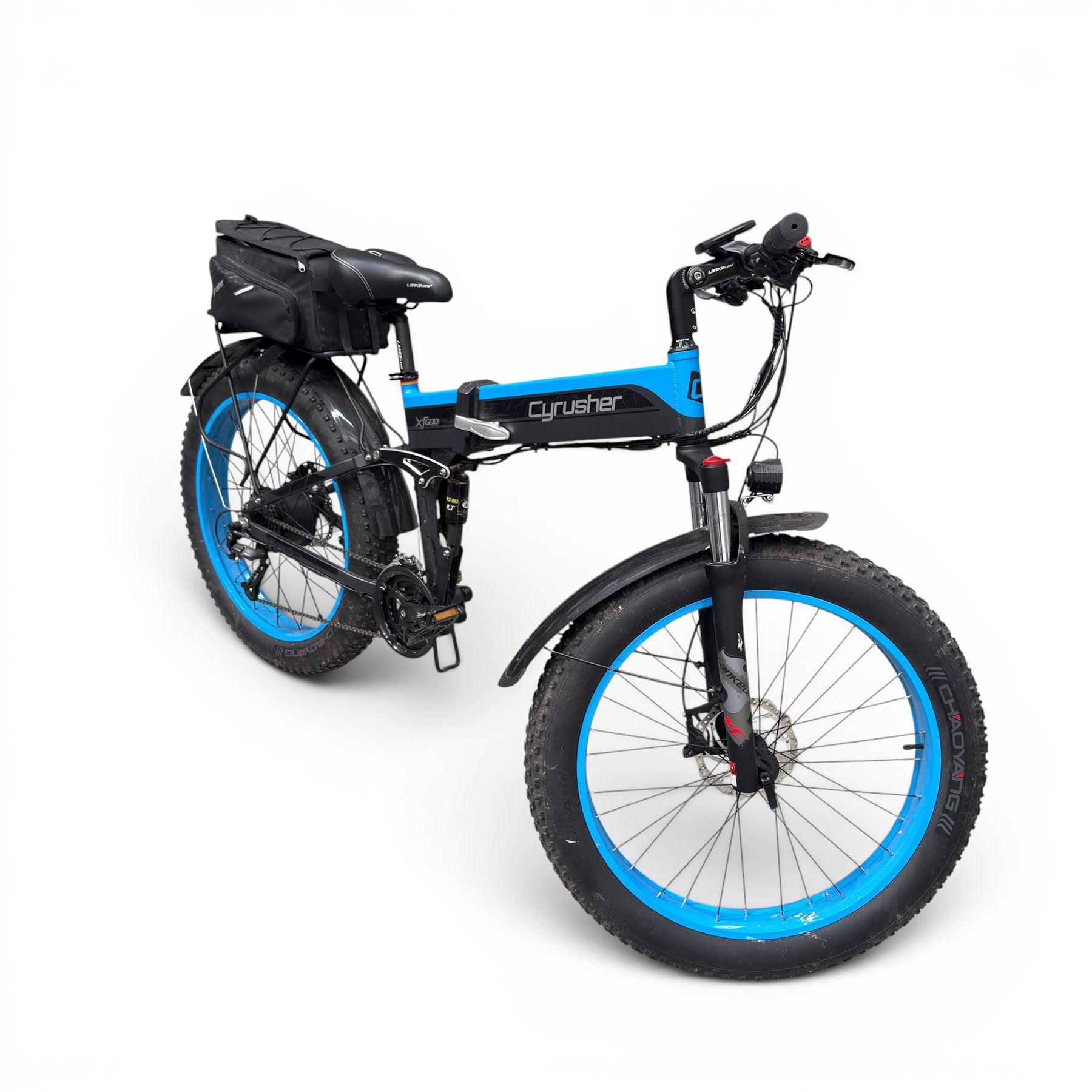 Cyrusher XF690 Plus - electric fat tyre bicycle, 250W model, with suspension forks, disc brakes, rear pannier bag and blue and black finish.