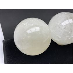 Set of three clear calcite spheres, D8cm