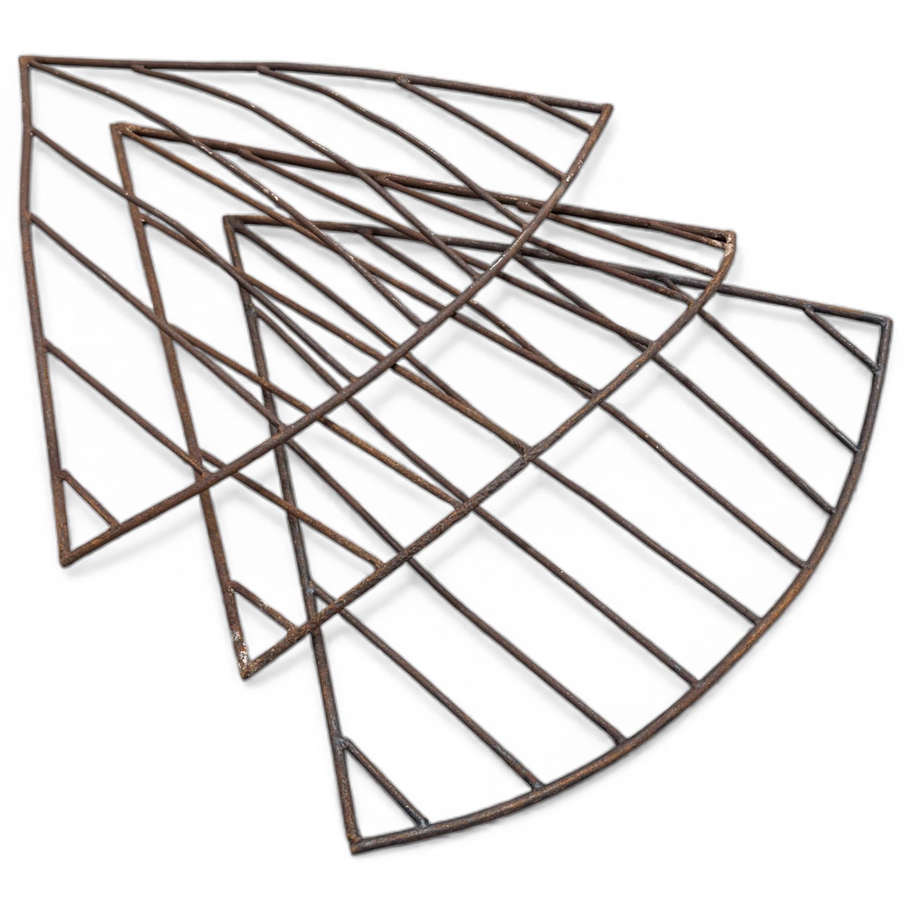 Three corner hay racks along with one normal rack