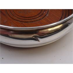 Modern silver mounted bottle coaster, of plain circular form with turned mahogany centre, hallmarked W I Broadway & Co, Birmingham 1979, D13cm
