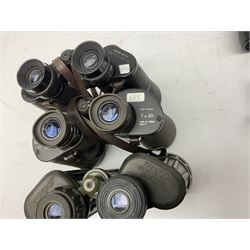 Eleven pairs of binoculars to include Lieberman & Gortz 20x65, Stem (USSR) 7x50, Helios 10x50 Field, Prinz 12x50, Tasco 8x40, Tasco 10x50, etc