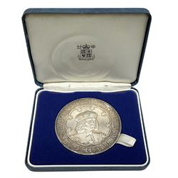 Hallmarked sterling silver commemorative medallion, 'College of Arms Quincentenary', approximately 150 grams, housed in a Royal Mint box
