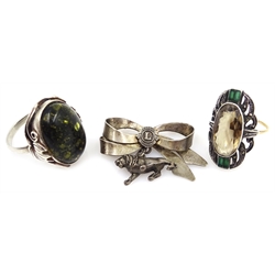  Gold and silver marcasite, smoky quartz ring, stamped 9ct, green amber ring stamped 925 and lion brooch stamped Stirling  