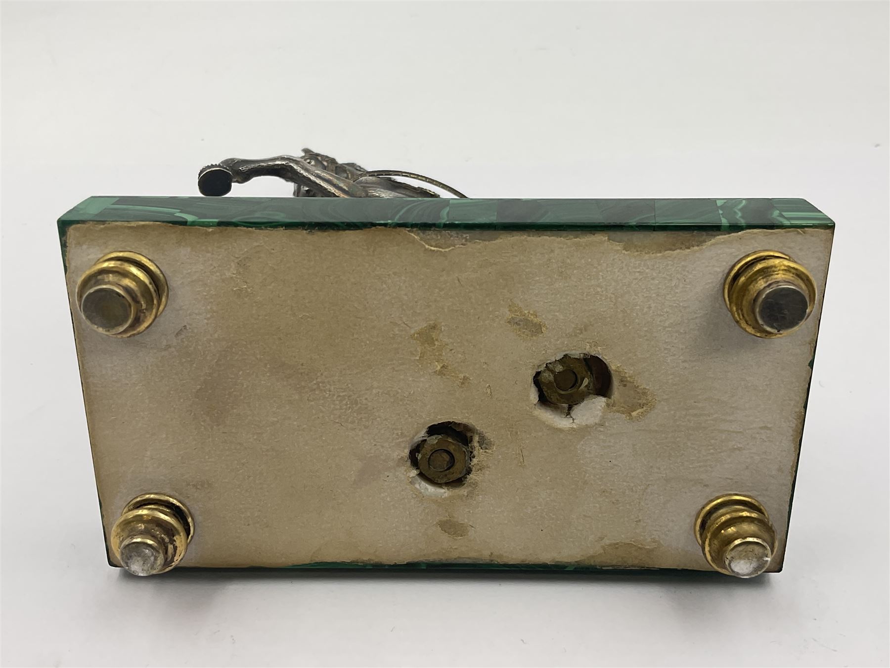 Modern silver model of a rearing horse, with ornate parcel gilt saddle and bridle, mounted upon a rectangular base, decorated with malachite panels to each side and upon four gilt bun feet, horse stamped 925, overall H14.5cm