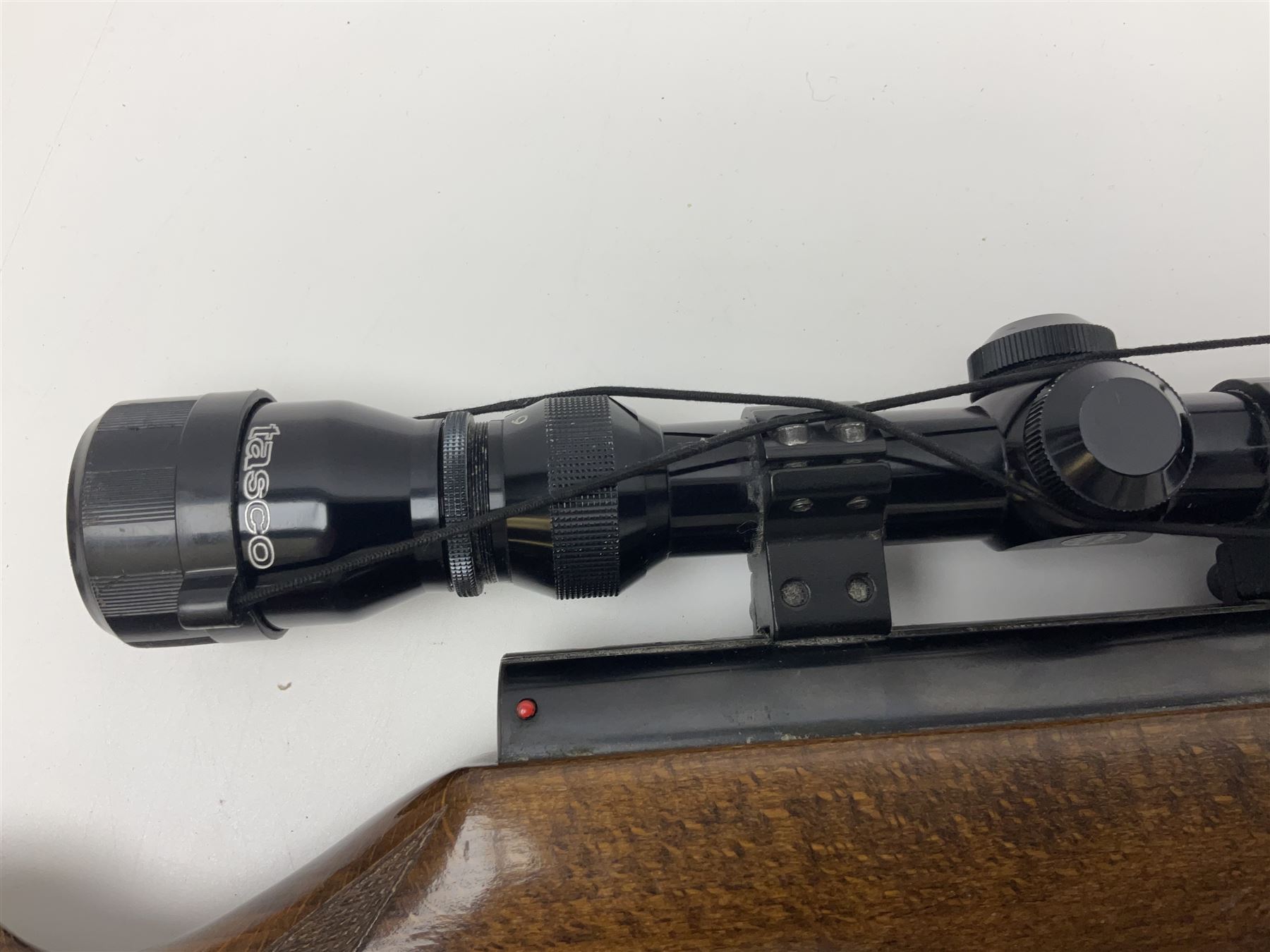 Weihrauch model HW 77 K  .22 air rifle with under lever action, beech stock with chequered pistol grip and Tasco WA39x40-1 scope, serial no.1283661 L102cm overall NB: AGE RESTRICTIONS APPLY TO THE PURCHASE OF THIS LOT