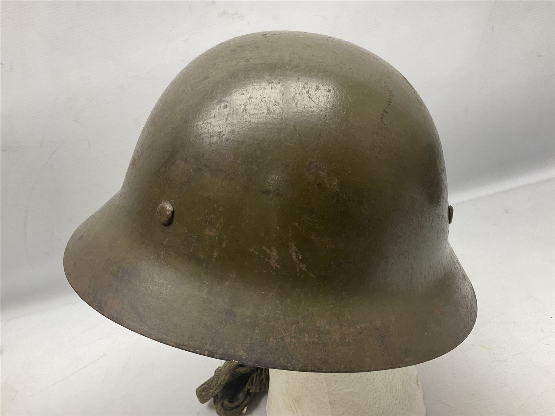 WW2 Japanese Army type 92 steel helmet with infantry star badge to centre, webbing liner and chin strap