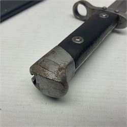 Austrian Model 1895 Carbine knife bayonet with 24.5cm fullered steel blade; various marks to the ricasso including F.G. GY.; cross-piece marked No.7843; in steel scabbard L37cm overall