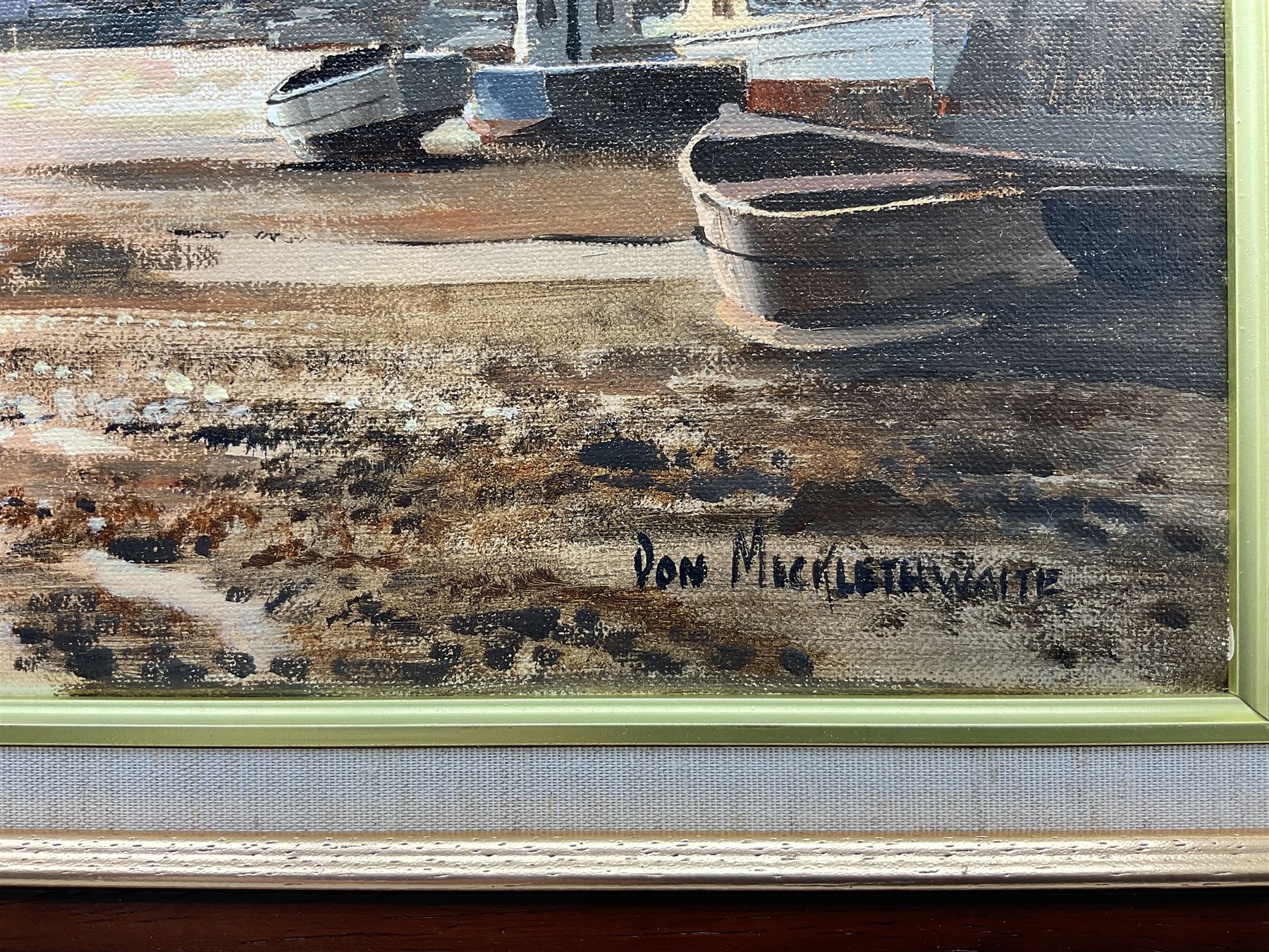 Don Micklethwaite (British 1936-): Whitby Swing Bridge at Sunset, oil on canvas signed 30cm x 39cm 