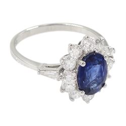 18ct white gold oval sapphire and round brilliant cut diamond cluster ring, with tapered baguette cut diamond shoulders, stamped 750