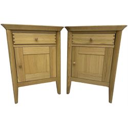 John Lewis - pair of oak bedside cabinets, each fitted with single drawer and panelled cupboard 