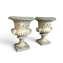 Pair of large cast stone garden urns, circular form with egg and dart border, tapering gad...
