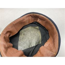 Black painted three colour railway lamp with revolving filters, H29cm; BR Acme Thunderer whistle; three railway peaked caps, two with BR Intercity 125 badge; small album of photographs of railway interest etc