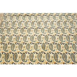 Central Persian Kashan hand-knotted carpet, ivory field densely decorated with all-over repeating botehs motifs, arranged in rows and enclosed by scrolling vine work and floral sprays, in a palette of indigo, pale blue, sage green and muted terracotta tones, within ivory borders of small boteh motifs flanked by border within large scale boteh motifs with multiple guard stripes, with cotton fringe ends 