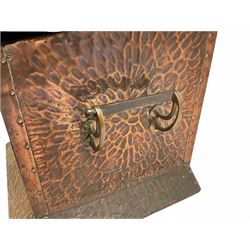 Arts and Crafts copper coal box, of square form with twin curved handles, with hammered finish, and embossed stylised motif to the front and hinged cover, H37cm L40cm D35.5cm