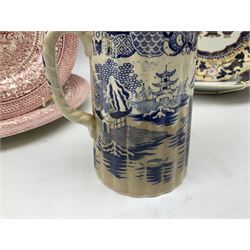 Four mid 19th century Mason's Ironstone plates decorated in the Chinese Antiquities pattern, the central circular panel decorated with footed vase with stylised motifs within a floral border, with gilt detail, pattern no. 1438, largest D26cm, together with Royal Worcester plate with floral decoration within green borders, blue and white tankard with pewter lid and teapot, teapot
