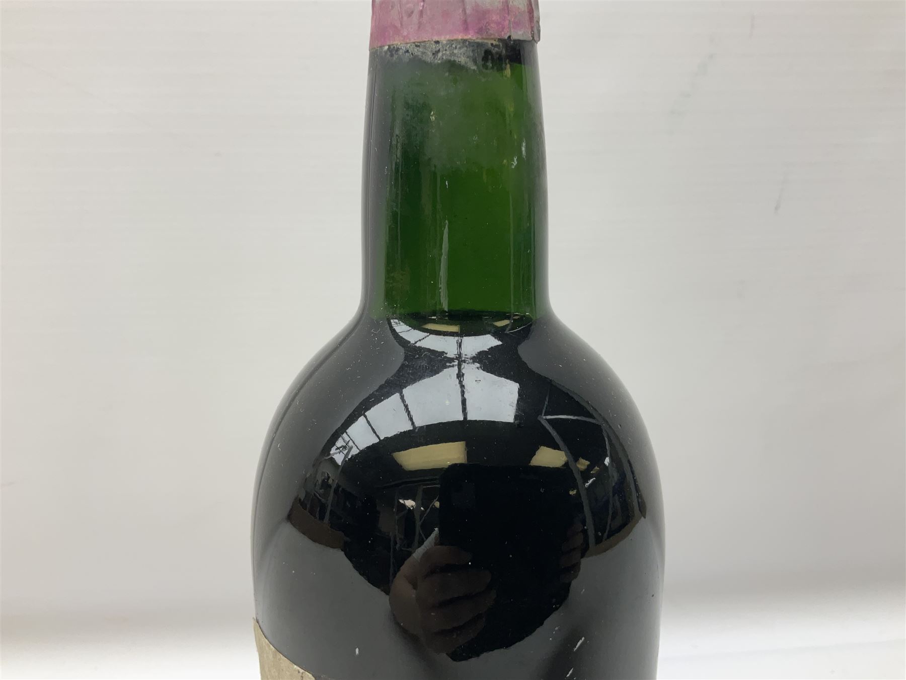 Four bottles of Haig's Dimple Old Blended Scotch whisky, all 26 2/3 Fl.OZs, 70 proof, one in original box and a bottle of East India 1961, Madeira, unknown contents and proof