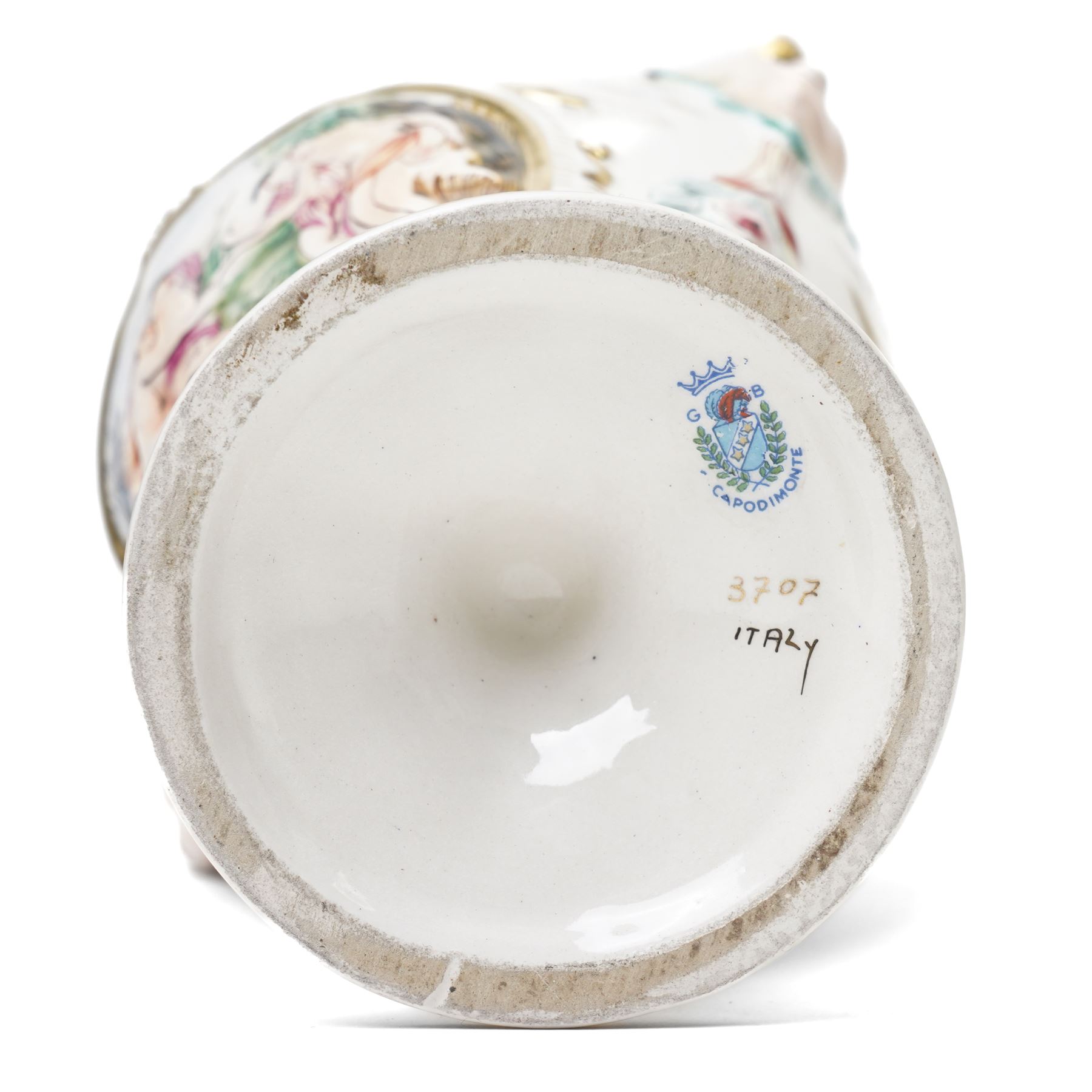 Capodimonte vase and cover decorated with a raised pattern of cherubic figures H32cm, another vases and cover with panels of figures H33cm, bowl and cover with similar decoration D20cm and two other Capodimonte pieces (5)