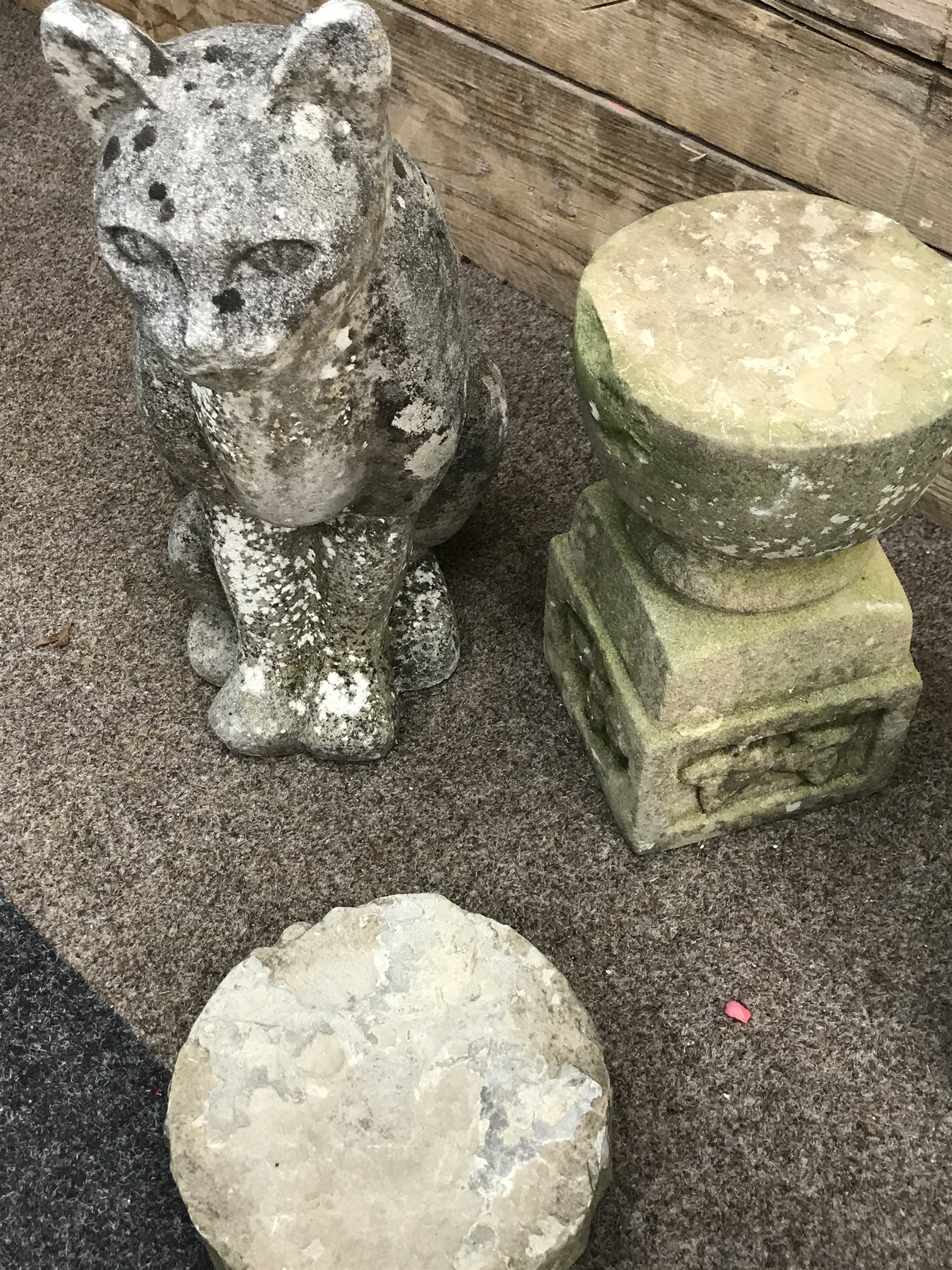 Collection of various stone and composite stone garden ornaments including; cat figure, stone two piece bird bath, Easter island head, tortoise etc.. (11)