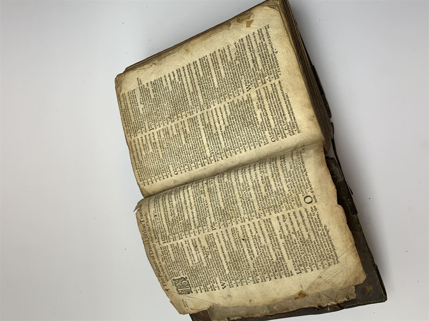 The Holy Bible, Containing the Old Testament and the New; Newly Translated out of the Originall Tongues ..., Imprinted at London by Bonham Norton and John Bill 1620. General and New Testament titles with woodcut border (New Testament title and colophon dated 1621), genealogies and double page map by J.S. (John Speed), Apochrypha present, bound with Two Right Profitable and Fruitfull Concordances .... Collected by R.F.H. Imprinted at London Bonham Norton and John Bill 1622, bound with The Whole Booke of Psalmes Collected into English Meeter by Thomas Sternehold, John Hopkins, and Others ..., printed for the Company of Stationers 1623. Full calf binding with bronze bosses.